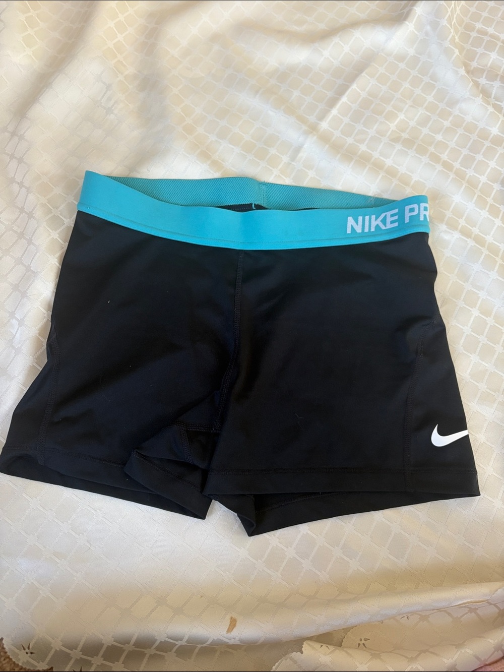 Nike Pro Black Shorts with Teal Waistband and White Swoosh